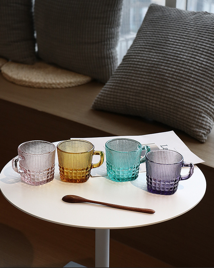 Textured Colored Glass Coffee Cups and SaucerOur Dining Table